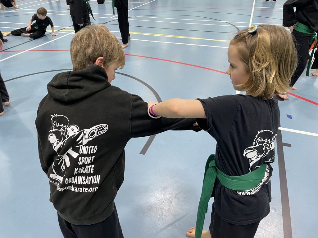 Children practising techniques together